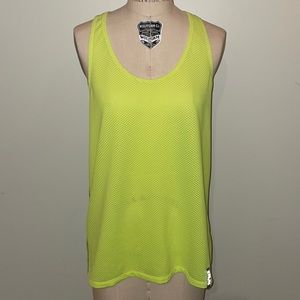 Bright yellow Underarmor tank top